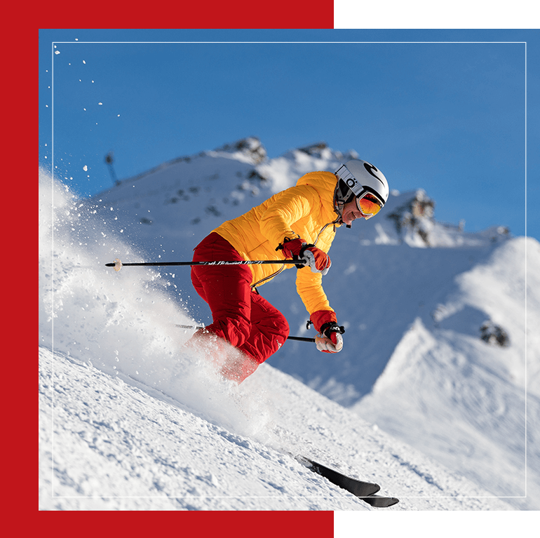 Free-ride skier running downhill